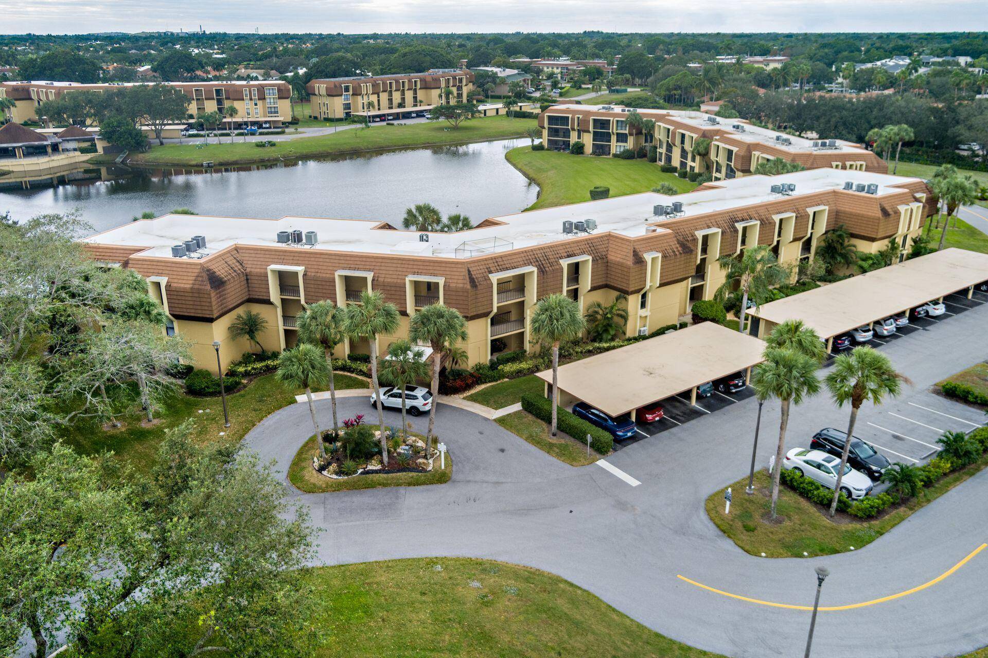 Beautifully appointed and renovated throughout in this 2 bedroom 2 bath with serene lake views covered parking.