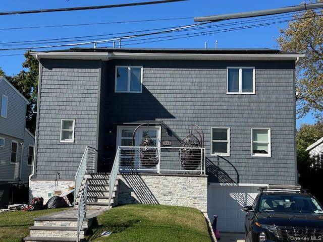 Expanded in 2021 this spacious open layout Colonial in Hewlett School District 14 is on the market for the first time.