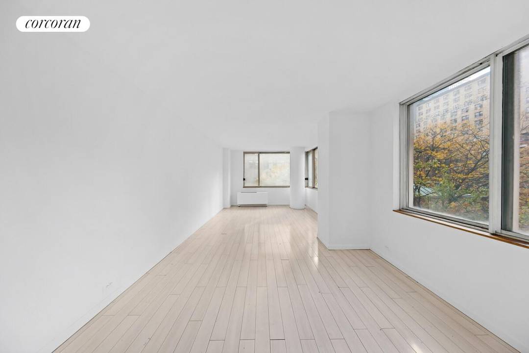 Sun Filled Corner Studio at One World Plaza Experience luxury living at its finest in this spacious corner studio, bathed in natural light from eight oversized window panels showcasing beautiful ...