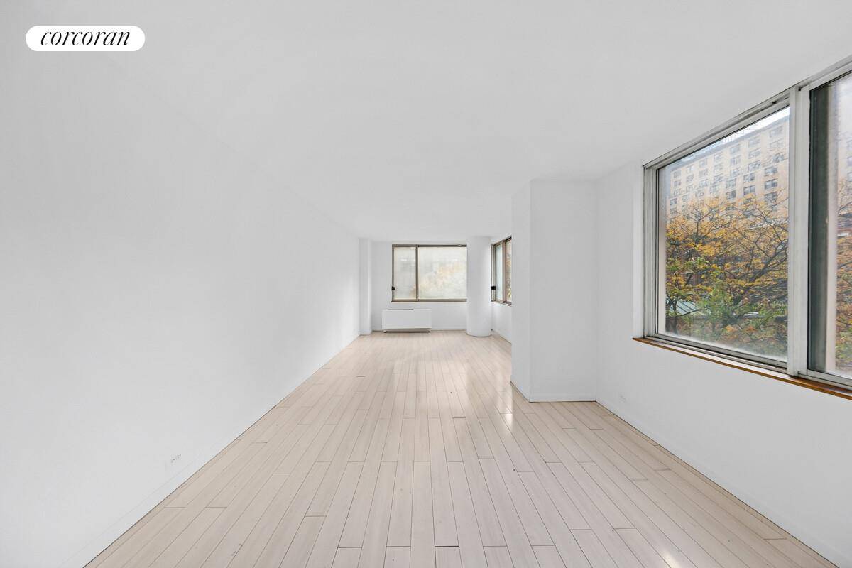 Sun Filled Corner Studio at One World Plaza Experience luxury living at its finest in this spacious corner studio, bathed in natural light from eight oversized window panels showcasing beautiful ...