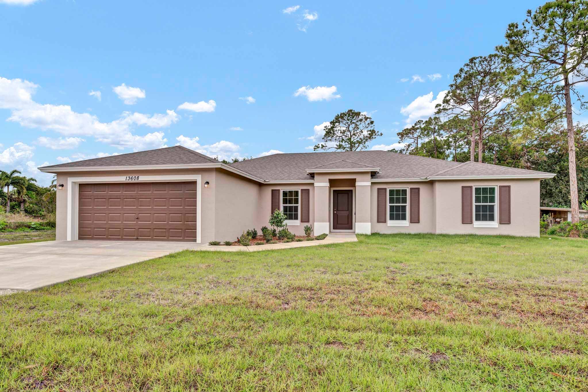 New Home with Energy Saving Features Spray Foam ceiling insulation, Foamboard insulation and double pane impact glass Vinyl windows.