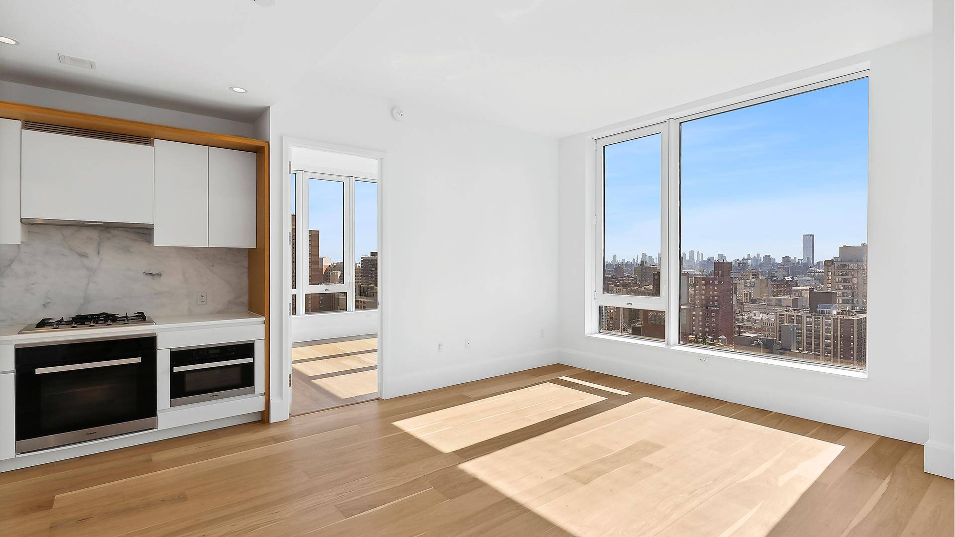 Residence 22B is a spacious corner 2 bedroom, 2 bath home featuring a thoughtful split layout and floor to ceiling windows, offering breathtaking views of the Manhattan skyline, including the ...