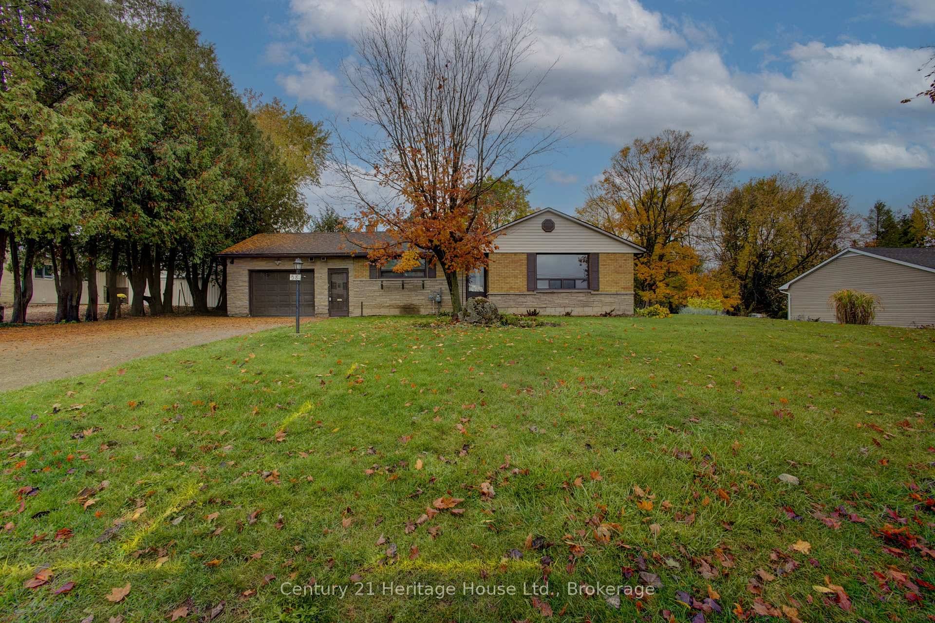 Discover this inviting bungalow that rests on an impressive 100' X 165' lot, offering a great combination of size and single level living.
