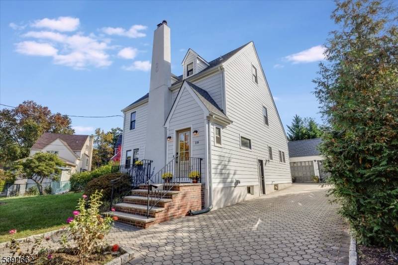 Welcome to this beautifully updated home filled with warmth and charm on a lovely tree lined street in the desirable town of Glen Rock.