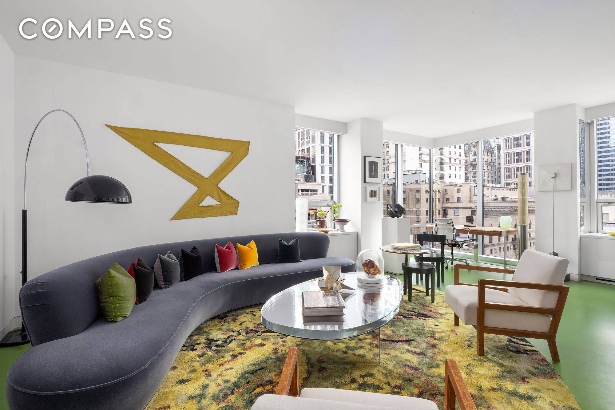 Impeccably designed as a luxurious aerie overlooking the gardens of the Museum of Modern Art, this turn key 1 bedroom, 1.