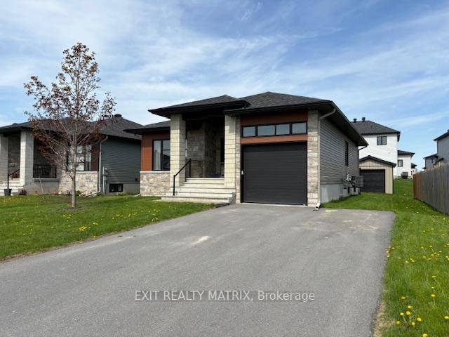 River view bungalow nestled in a family friendly neighbourhood.