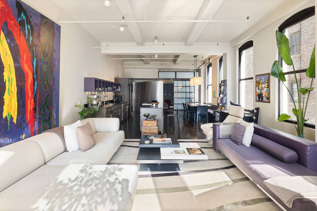 Move right into this sun drenched, sophisticated live work loft, offered fully furnished and sold as seen.