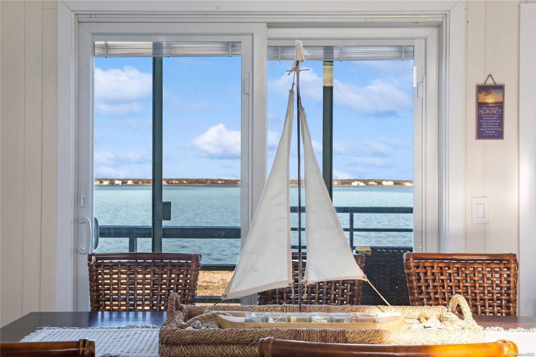 Absolutely Beachy ! This is the quintessential Dune Road bay front cottage experience with private Ocean access !