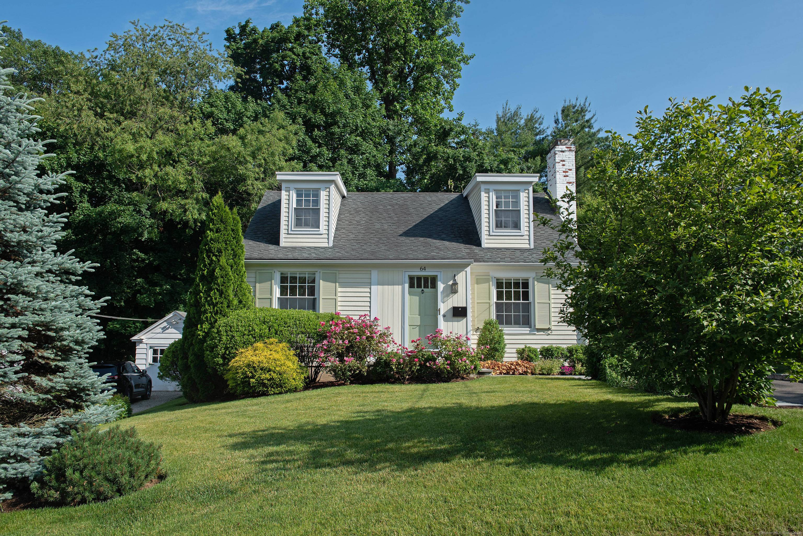 Completely renovated and updated charming four bedroom three full bath cape on a popular street close to town and Mead Park.