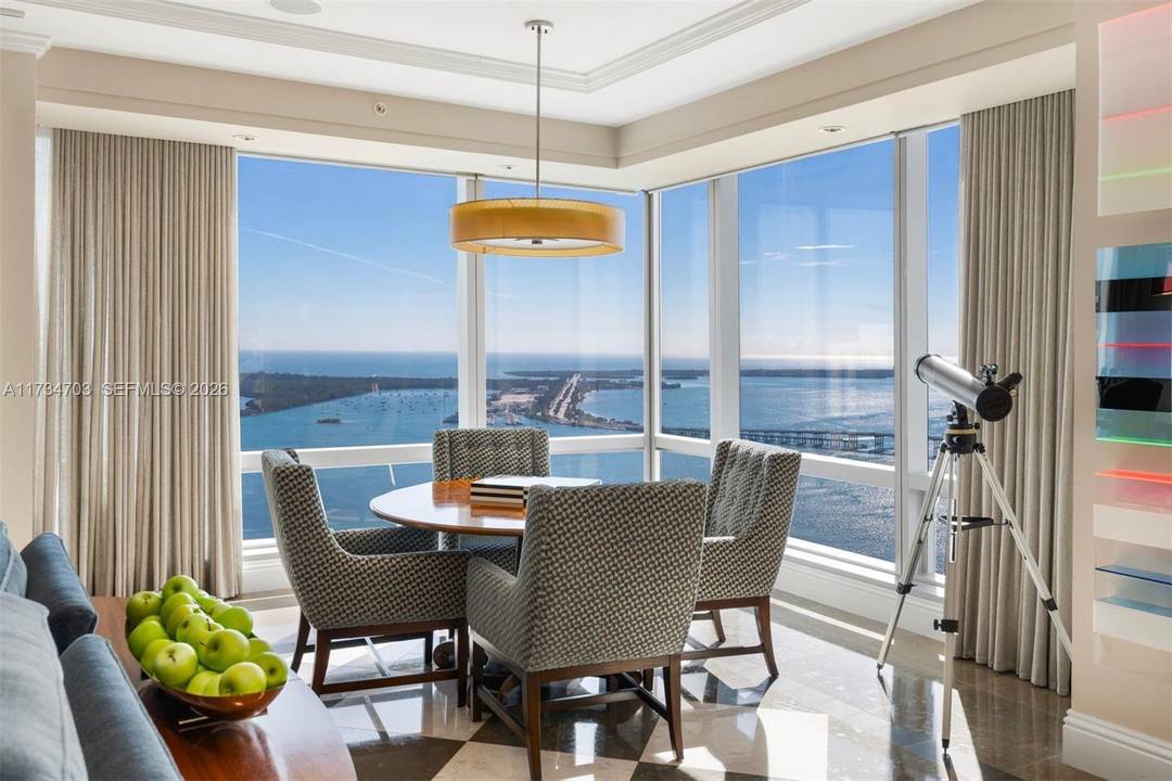 An exquisitely designed corner unit in the prestigious Four Seasons Residences, offering 5, 423 SF of refined luxury.
