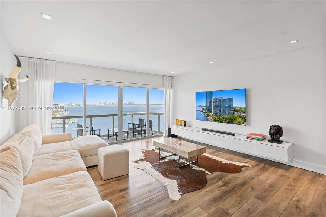 Gorgeously and professionally redesigned 3BR 2BA corner residence with direct, unobstructed views of Biscayne Bay, the South Beach skyline, ocean, Port of Miami, and sparkling city lights.
