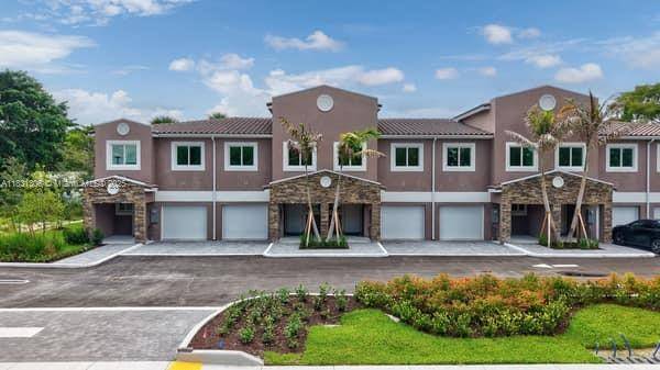 Discover the epitome of contemporary living at LOGAR VILLAGE, a NEW CONSTRUCTION project offering 11 exquisitely designed townhomes spread across two buildings with a shared common area.