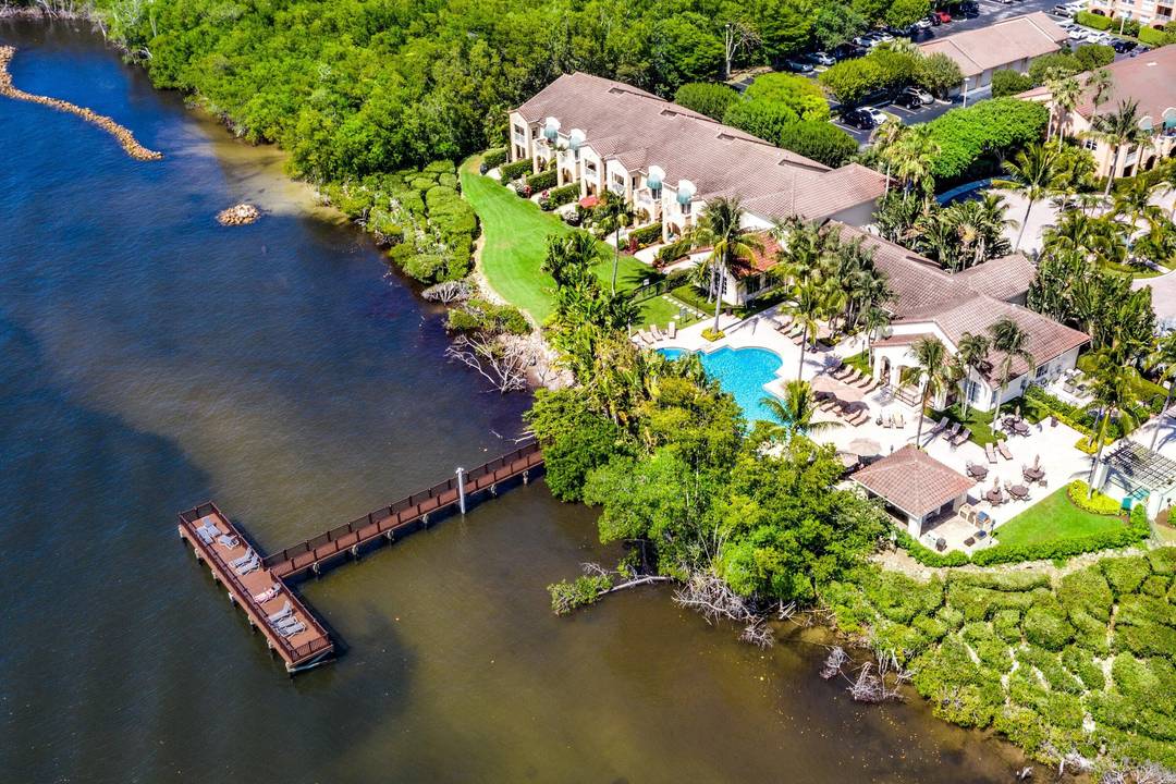 Beautifully furnished 2 BR 2 BA Highland Beach Club condo features a split BR floor plan, newer A C and hot water heater and smooth ceilings.