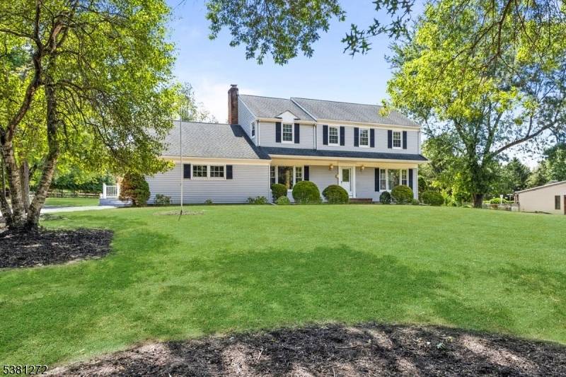 Welcome to this inviting home, set on nearly an acre of level property in a peaceful cul de sac ideal for everyday living and entertaining.
