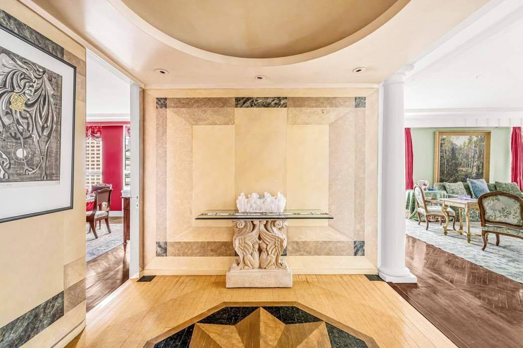 Rising above the Museum of Modern Art, Museum Tower remains one of Midtown s most distinctive luxury residences.