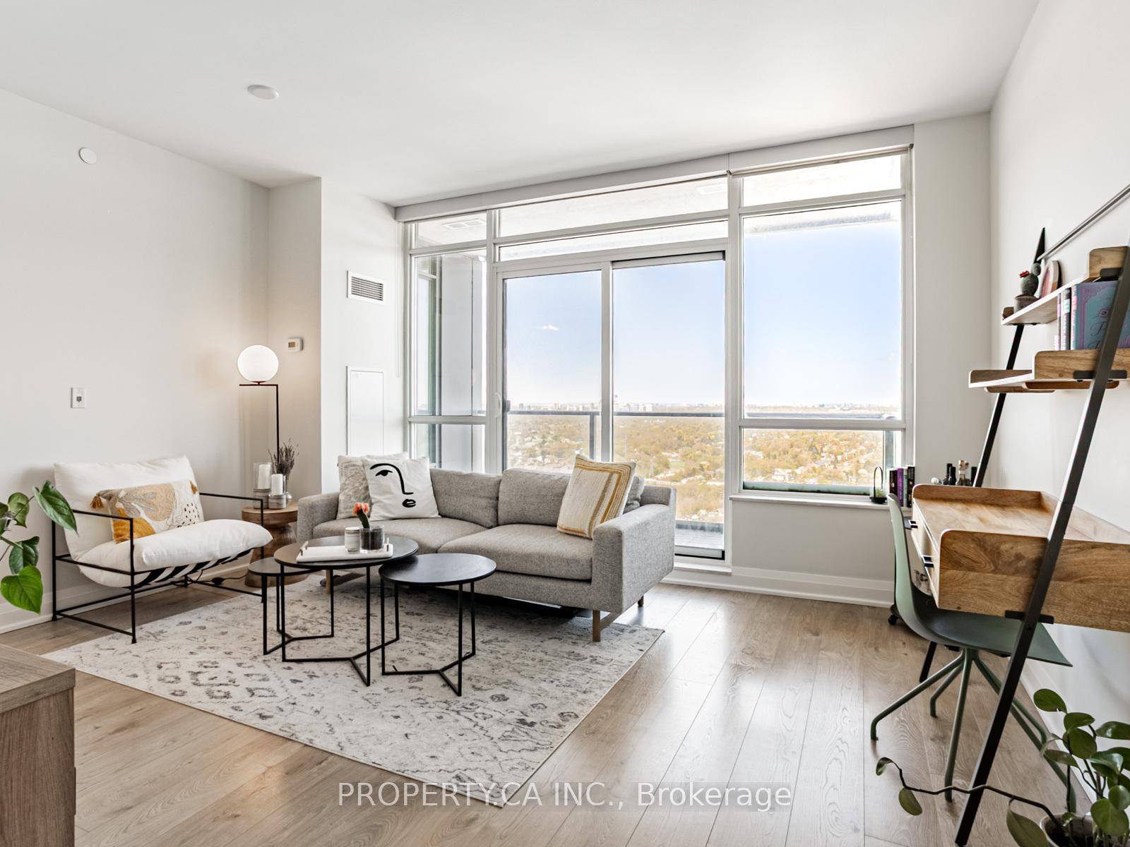 Bright Corner Unit with Spectacular Views in Sought After Mimico.