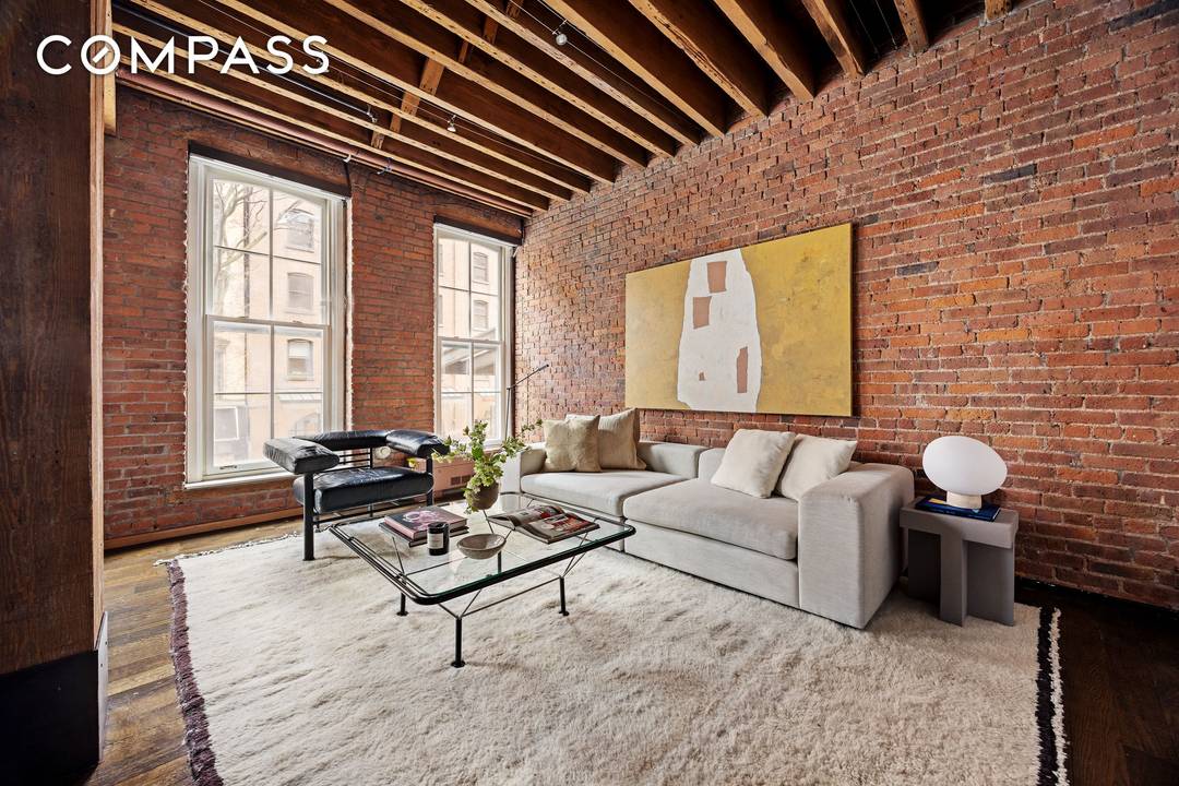 Authentic 2 BD 2 BA renovated loft with private terrace in prime Tribeca Historic District.