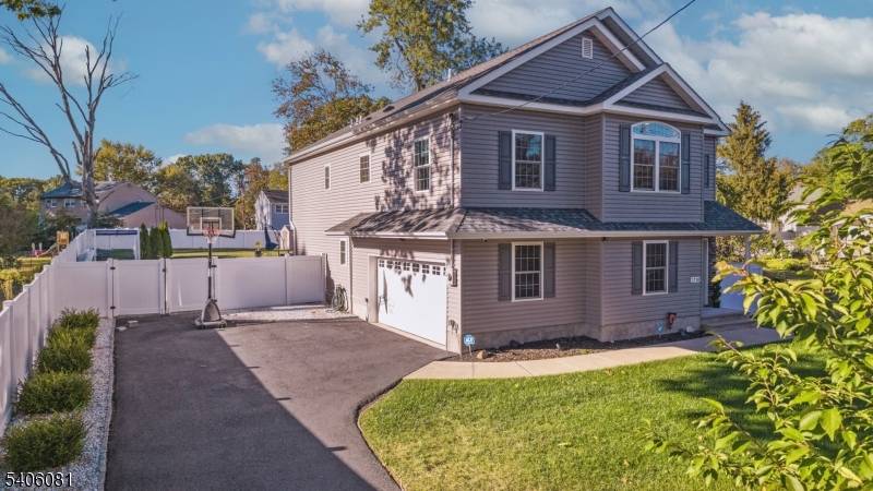 Welcome to this beautifully maintained Colonial built in 2019, offering modern comfort and a versatile layout with approximately 2, 439 sq ft of living space.
