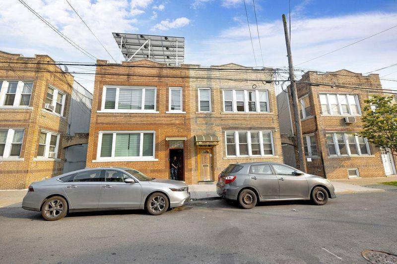 Beautiful semi detached brick 2 family home located in the heart of Ridgewood.