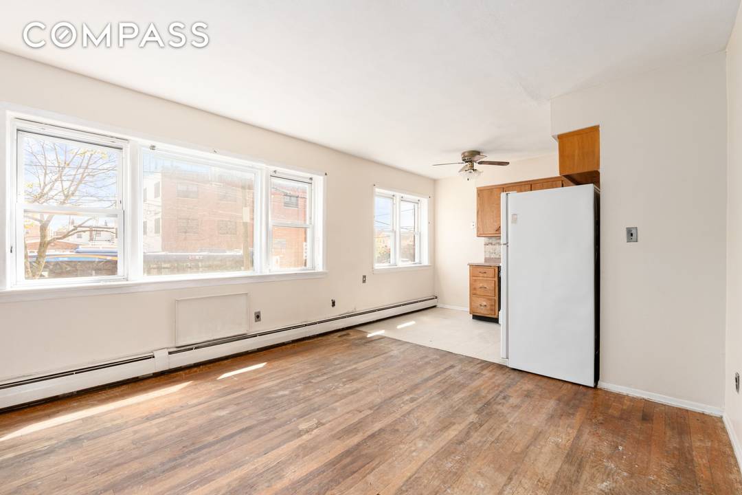 Welcome to 143 11 101st Ave, a spacious two family townhouse steps away from Jamaica Station which has the LIRR, the subway and the Airtrain.