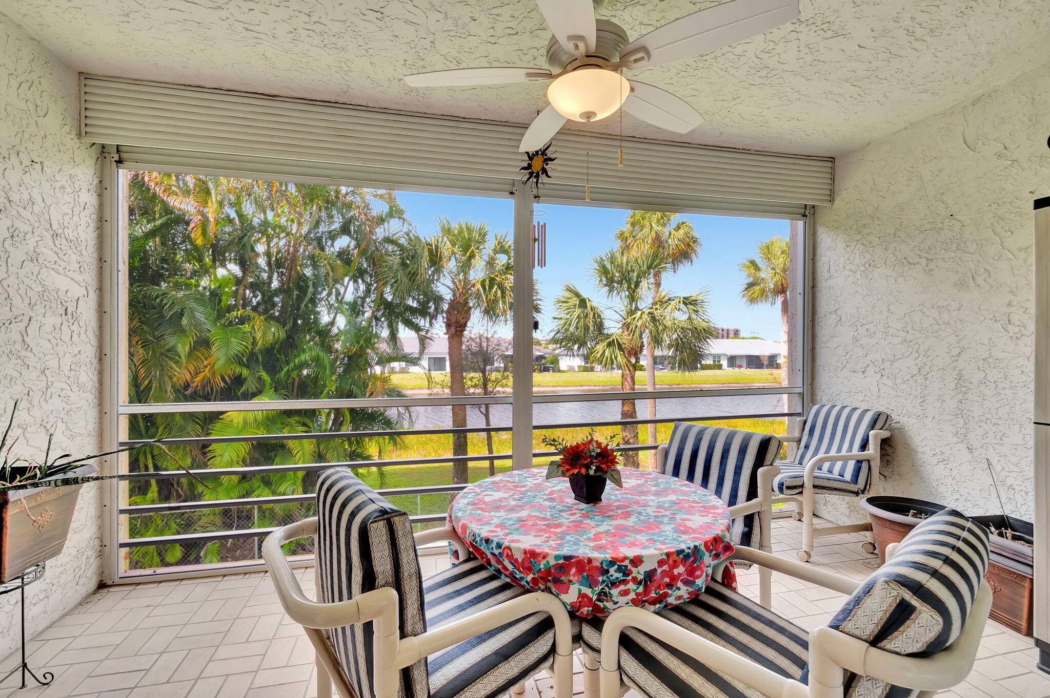 Spacious, updated 2 Bed 2 Bath corner unit with large covered balcony and lake view.