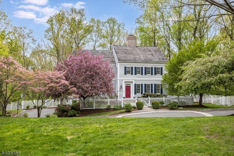 Tucked at the end of a quiet cul de sac in Chester's coveted Hedgerows neighborhood an intimate enclave of New England inspired custom colonials this exceptional home offers timeless elegance ...