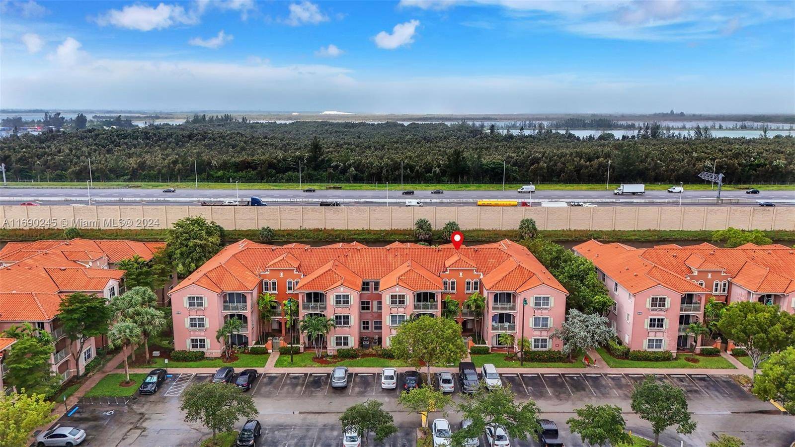 Spacious financeable condo with new roof in the heart of the desirable Doral area !