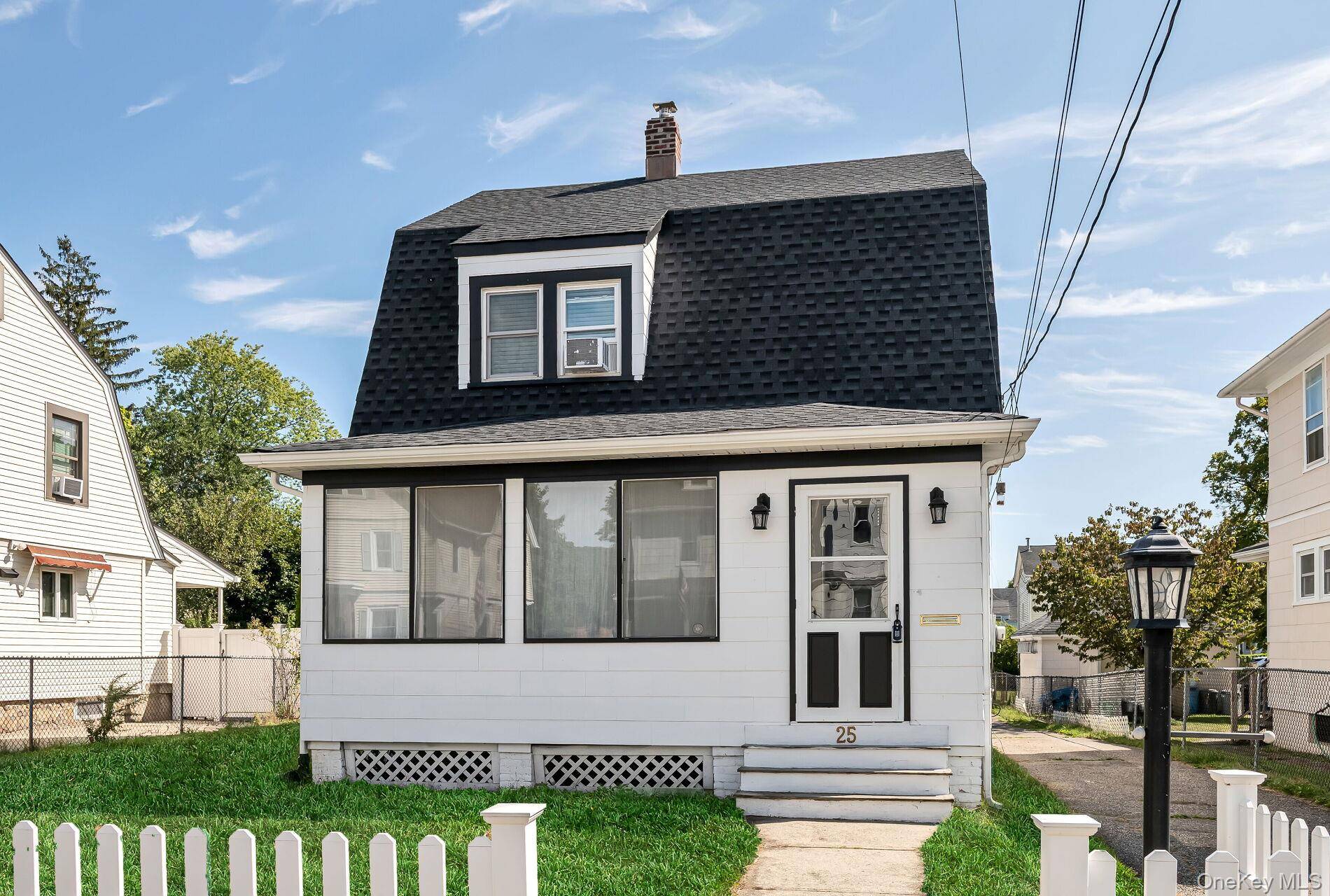 Charming three bedroom, two full bath Colonial in the heart of Suffern !