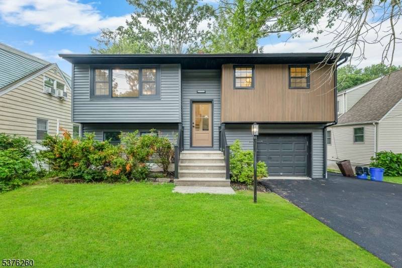 Welcome to your forever home, a beautiful FULLY RENOVATED bi level residence.