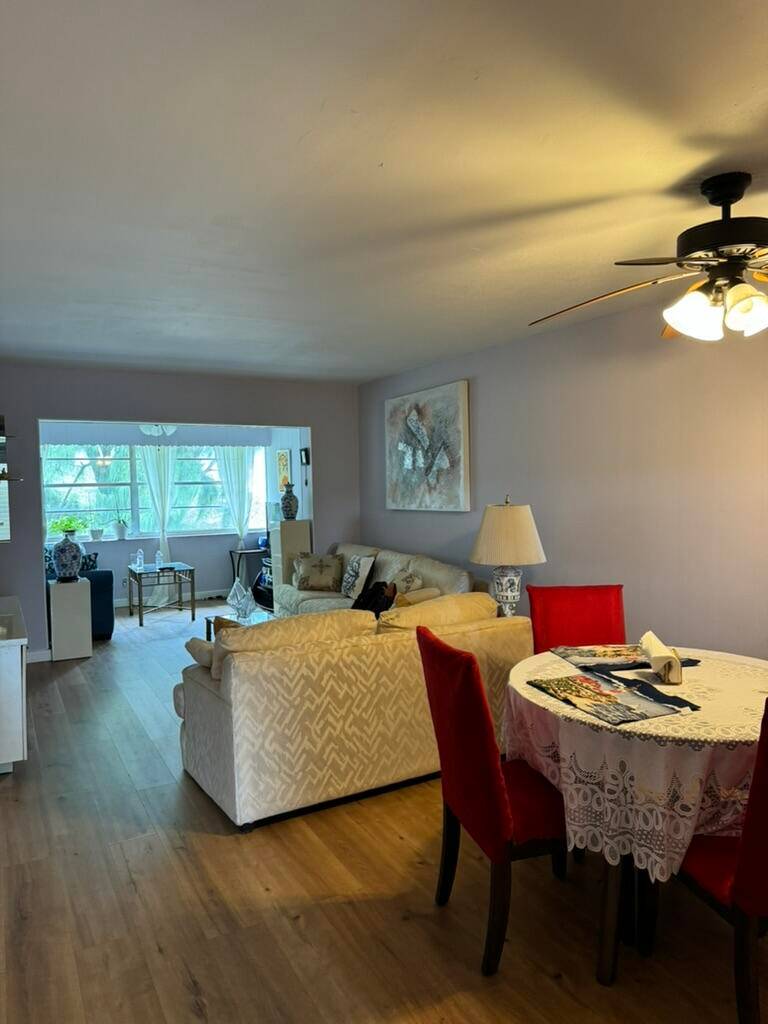 Few steps from elevator, enclosed patio makes this unit much larger, water, cable tv and internet included in the monthly fee.