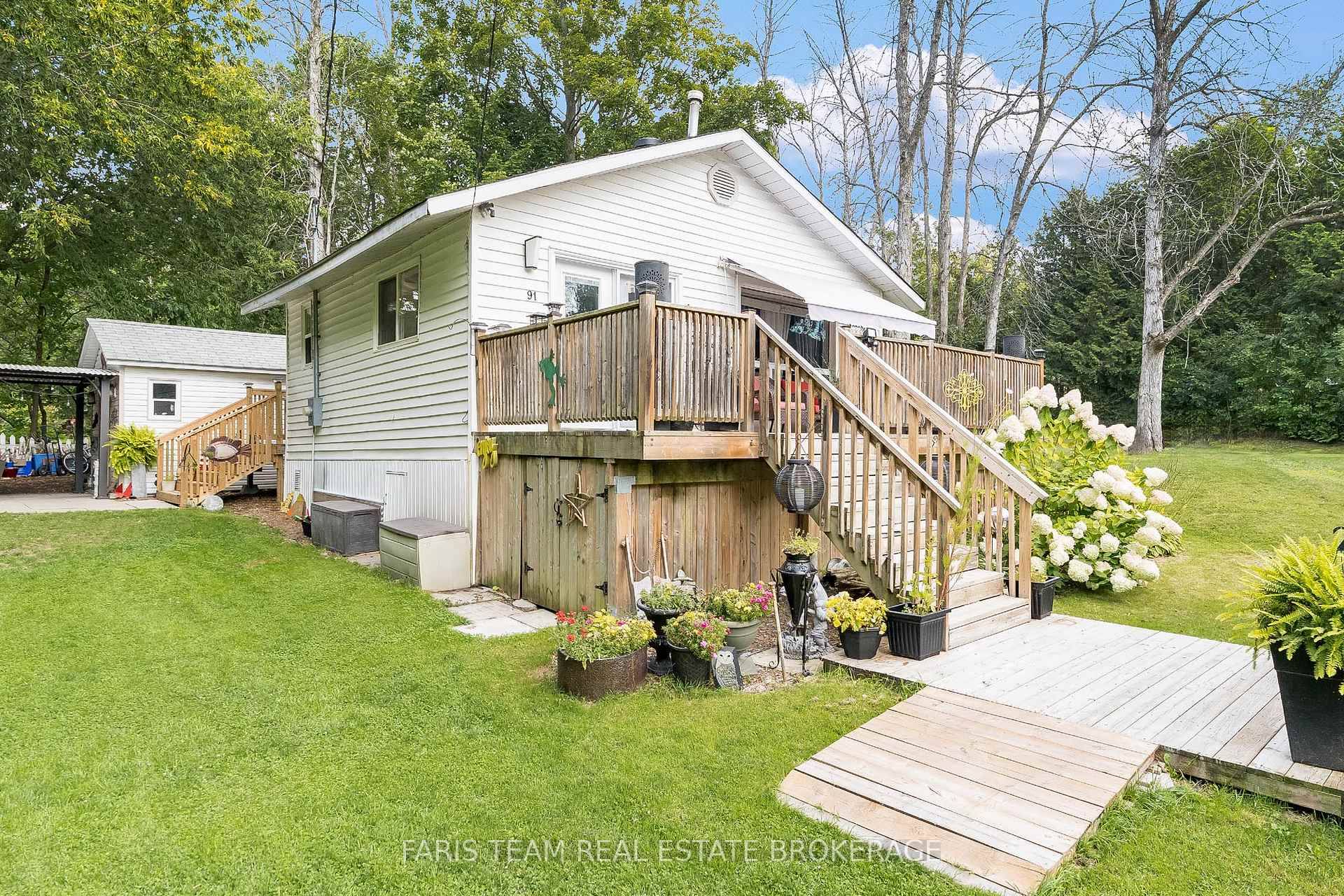 Top 5 Reasons You Will Love This Home 1 Charming raised bungalow just steps from the sparkling waters of Georgian Bay and a convenient boat launch, offering a lifestyle that ...