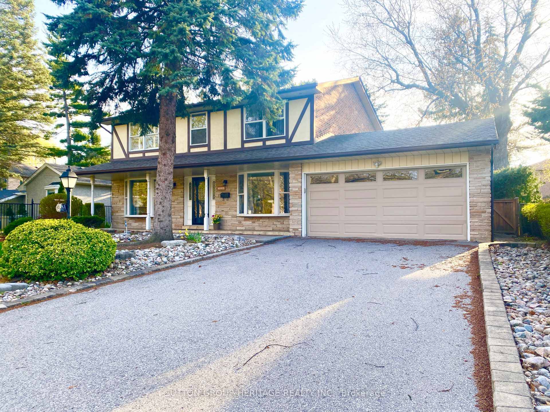 Deceptively large 4 bedroom home on a fabulous tree lined street, walking distance to shops and amenities.