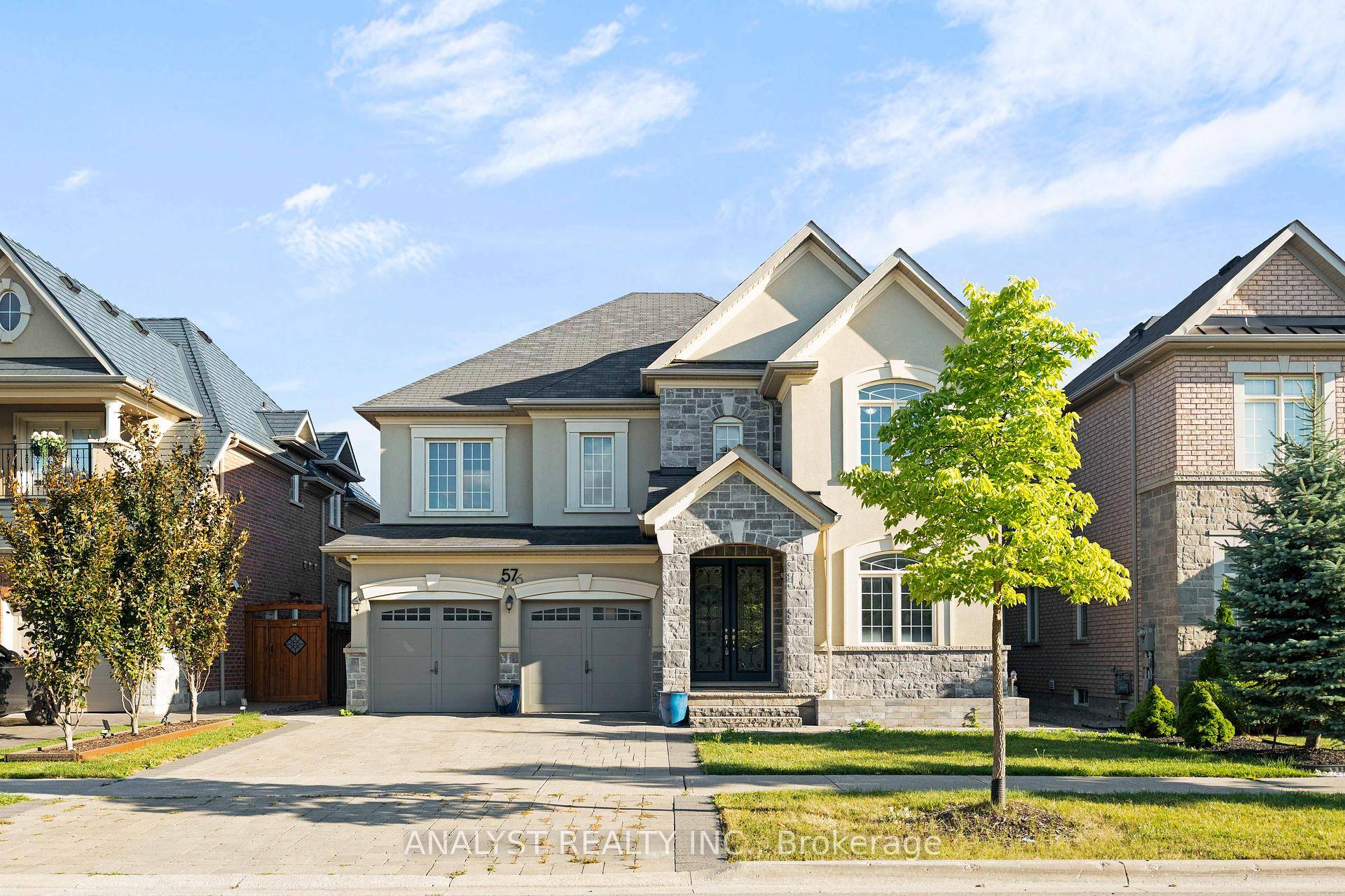 Welcome to 57 Balderson Drive, a beautifully appointed residence in the prestigious Kleinburg Hills community by Aspen Ridge Homes.