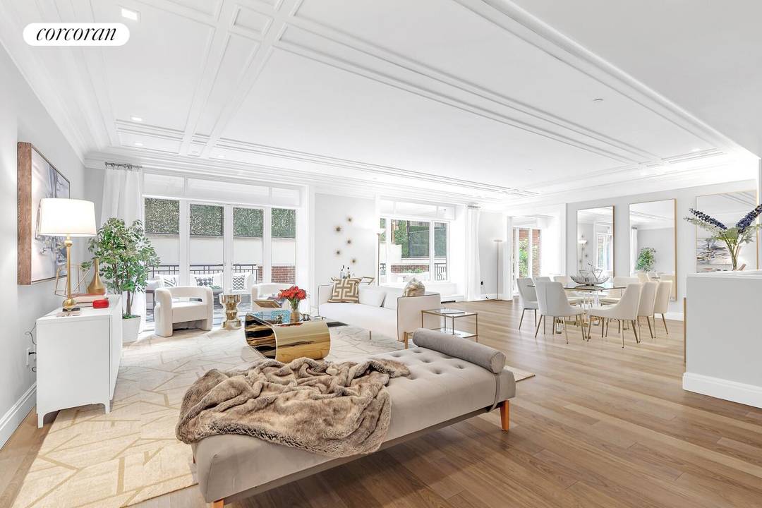 This sun filled, luxury 7 room duplex condominium on the Upper East Side's 'Gold Coast' is a stunning 4 bedroom, 3.