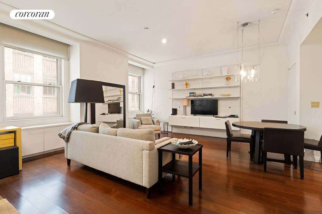 Welcome to Residence 828 at 55 Wall Street, a bright and spacious 886 square foot furnished loft located in the prestigious 55 Wall Street Condominium.