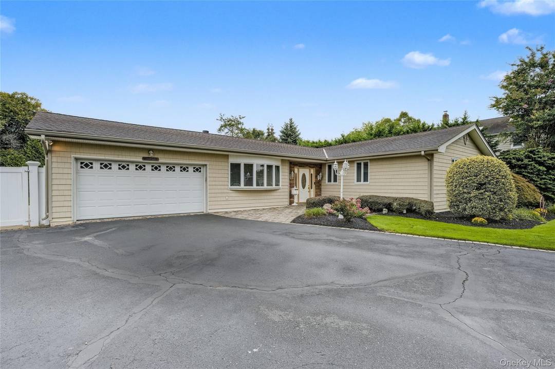 Welcome to 3 Feather Lane, a sprawling ranch set on a beautifully landscaped half acre in the sought after Candy section within the famed Commack School District.