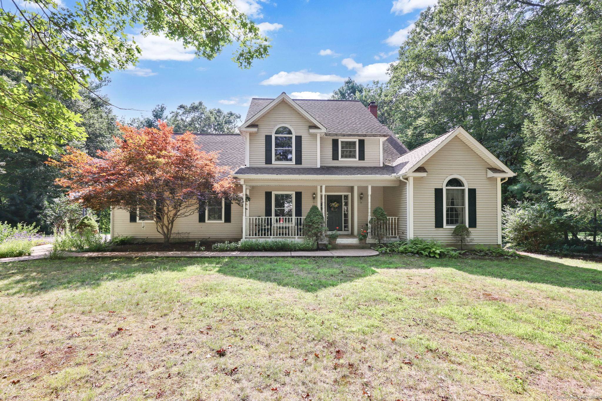 Spacious 3 4 Bedroom with In Law Potential in Tolland's Premier Neighborhood !