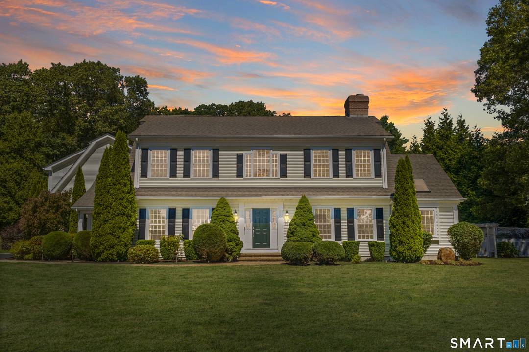 Sophisticated Colonial Retreat with Resort Style Backyard.