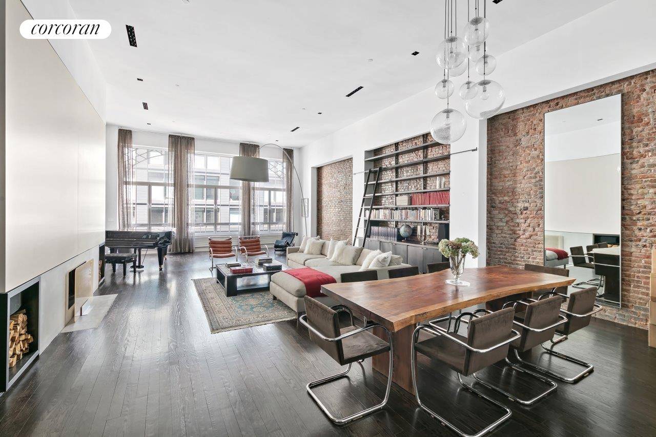 This floor through loft features enormous open spaces on both sides.