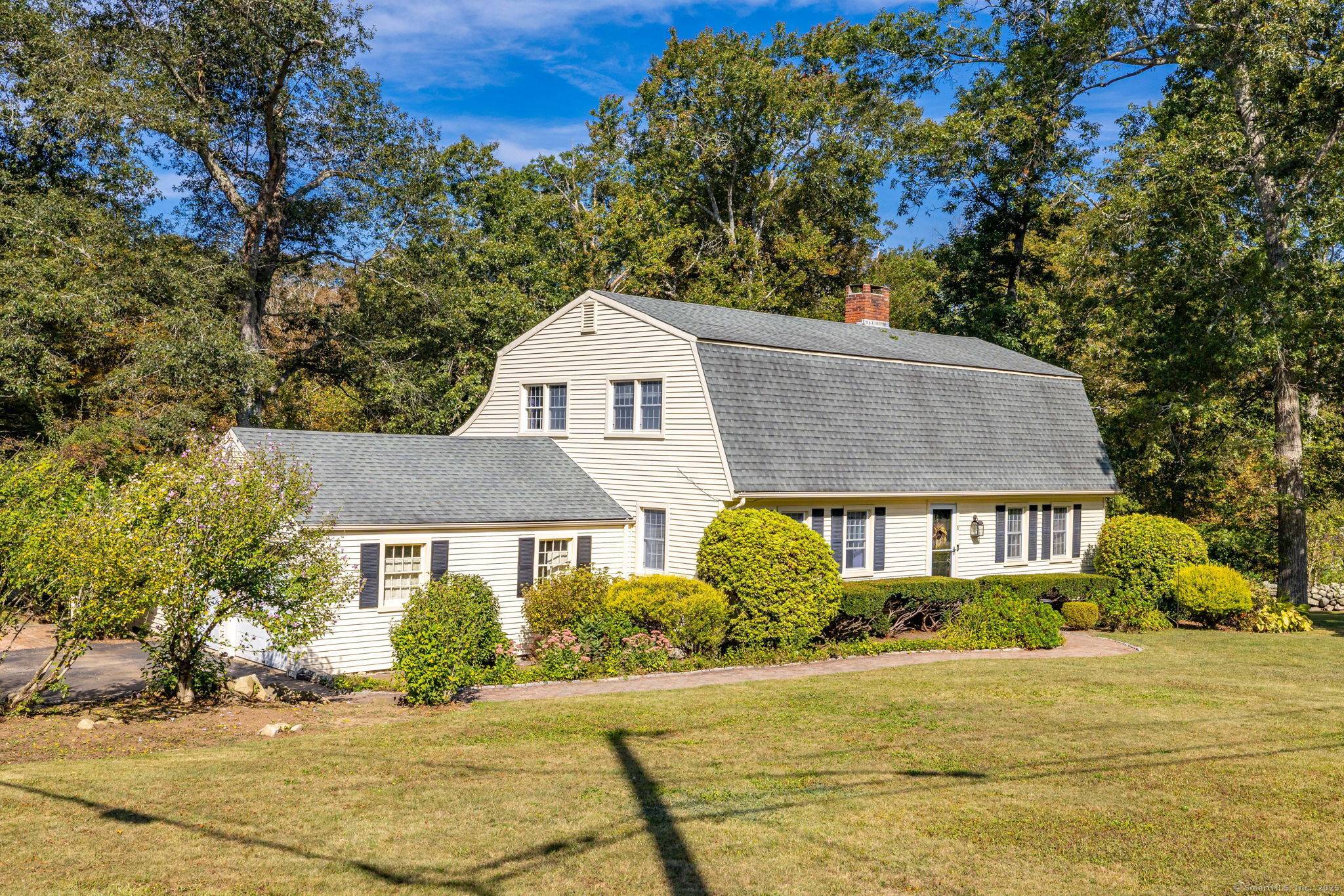 Introducing 19 Oakwood Drive, a charming Colonial set on a private 1.