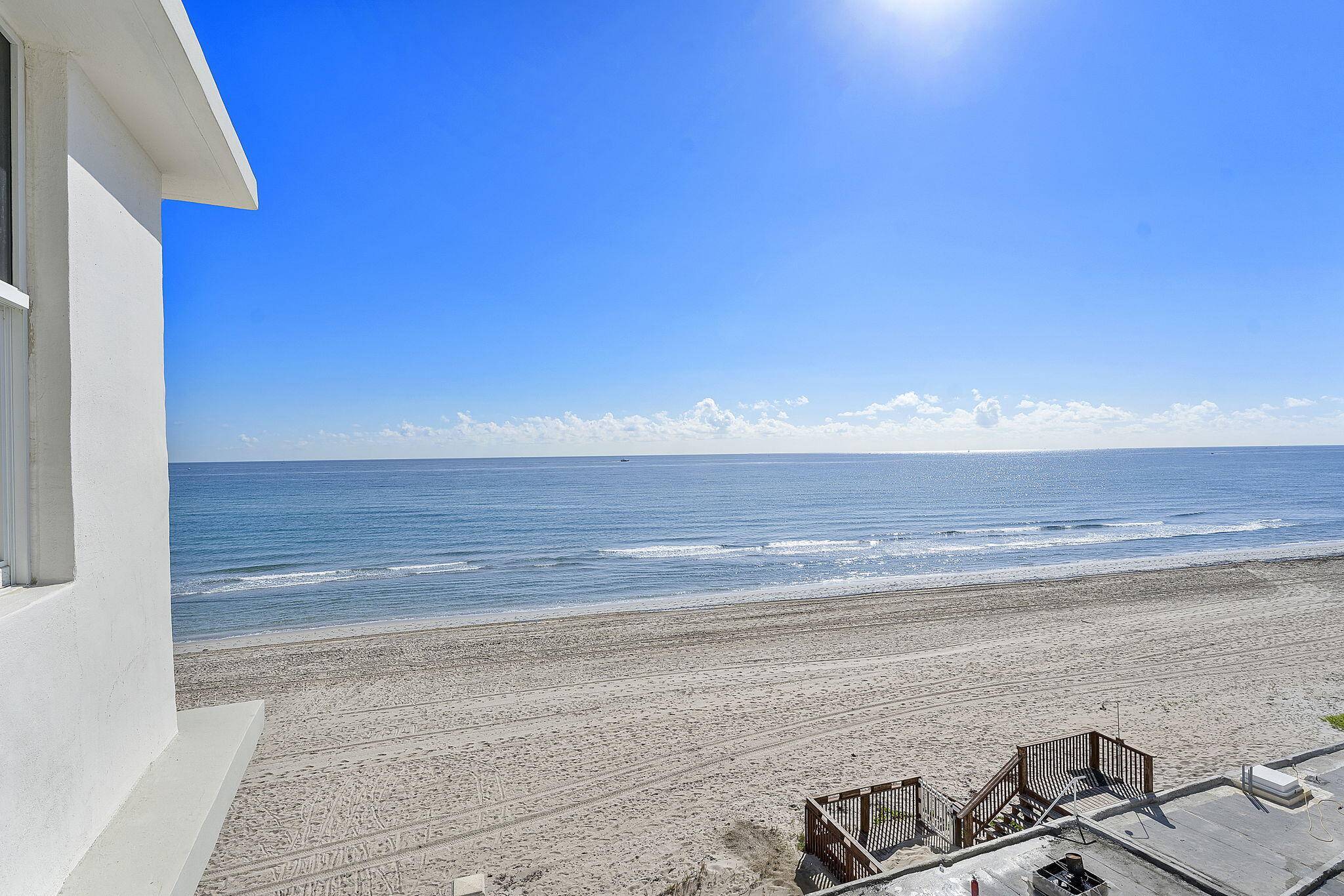 Discover the pinnacle of beachfront living at 4505 S Ocean Blvd, where every room showcases breathtaking, unobstructed views of the sparkling Atlantic Ocean.