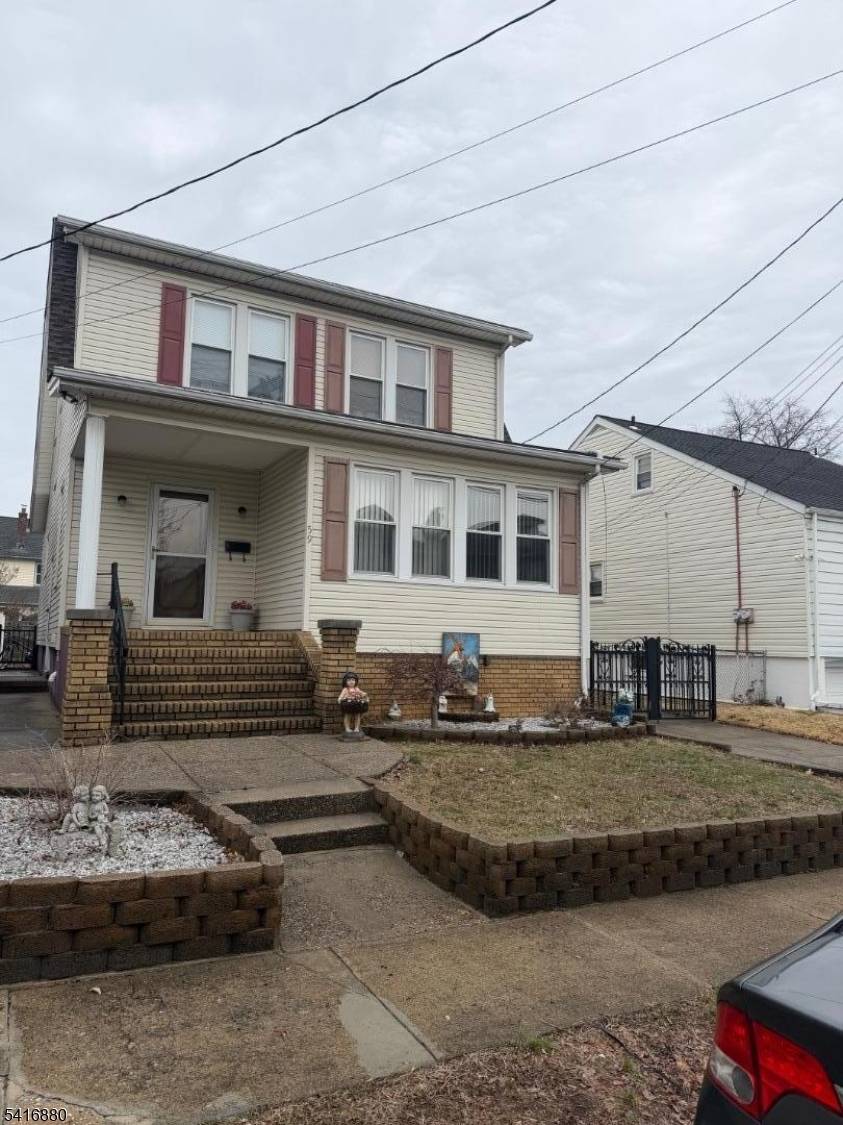 IMACULATE ONE FAMILY HOUSE WITH LARGE ROOMS, FOUR BEDROOMS WITH TWO FULL BATHS, BIG KITCHEN AND DINNING ROOM COMBINED WITH LIVING ROOM, HARDWOOD FLOORS THROUGHOUT, FINISH BASEMEMT WITH A WALKOUT ...