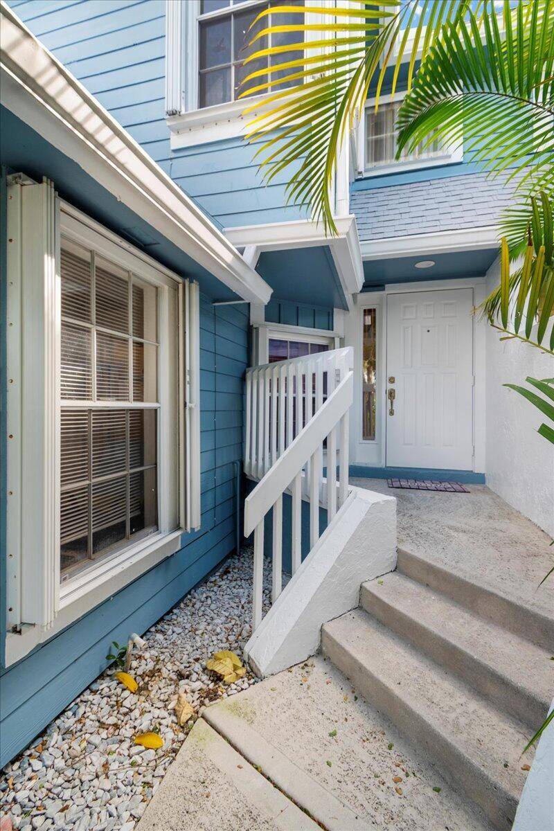 Live five minutes from the beach in this fully furnished, turn key 2 bedroom 2.