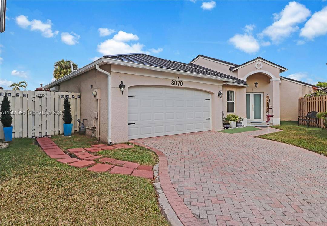 Nestled within the prestigious gated community of Lago Mar, this exceptional residence offers a perfect blend of modern upgrades and timeless architectural appeal.