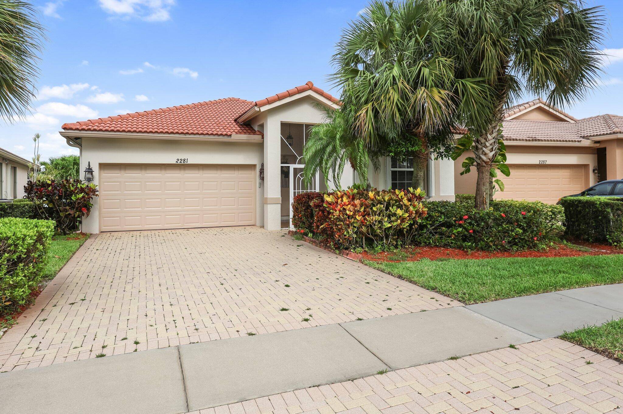 Welcome to this beautifully maintained 3 bedroom, 2 bath residence nestled in one of West Palm Beach's most sought after active adult communities.