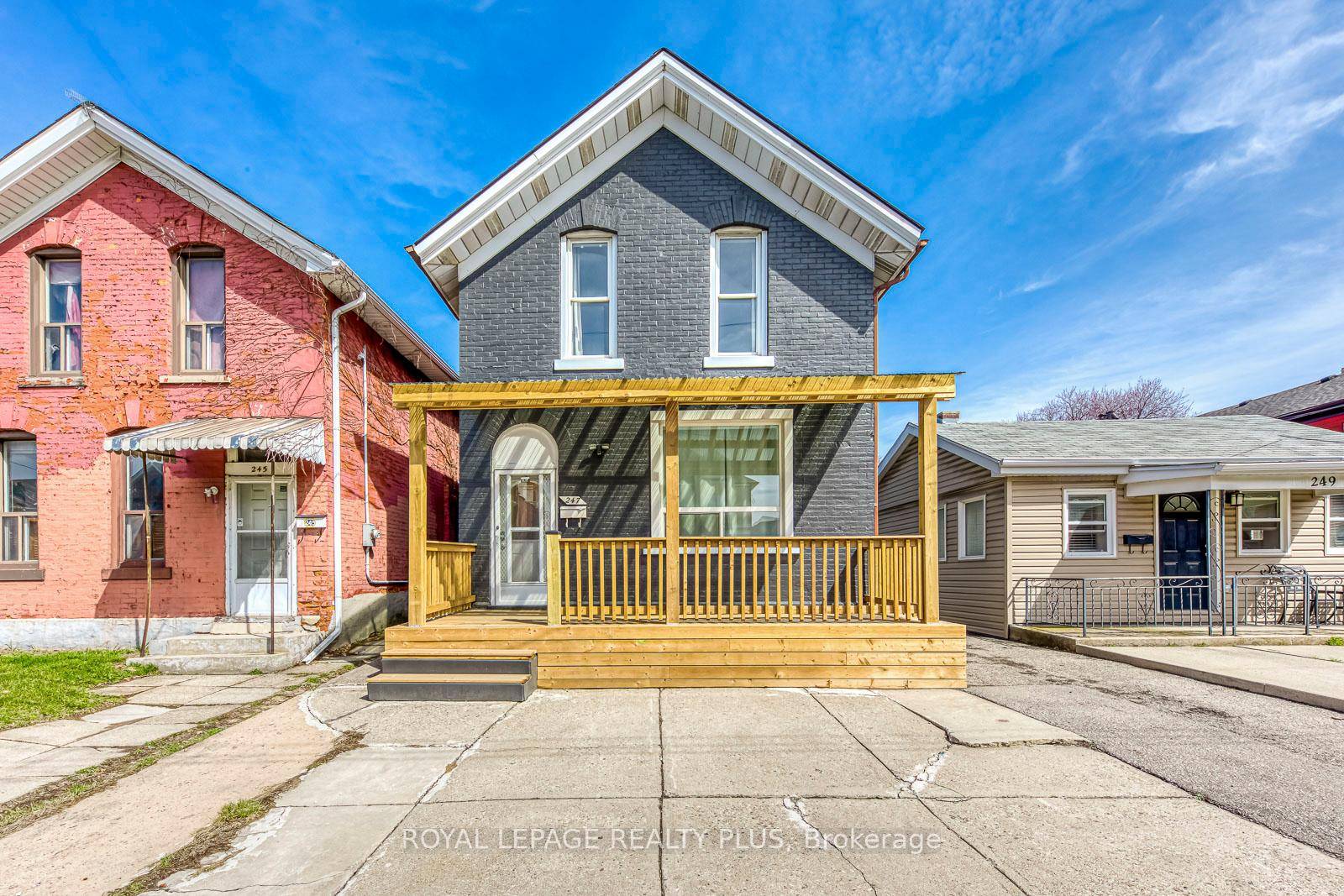 This unique and versatile detached home functions like a duplex, offering two completely separate units with private front entrances ideal for multifamily living or a turn key investment.