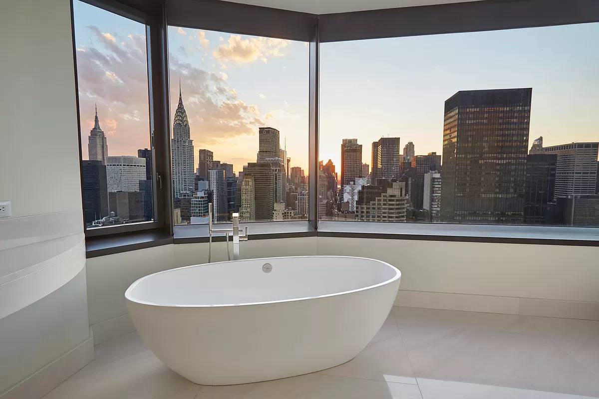 Introducing an exceptional full floor condominium residence boasting 5 bedrooms, 2 staff bedrooms, and 6.