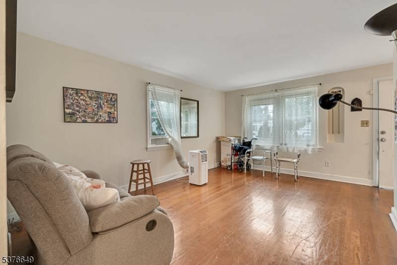 Charming and Spacious Cape Cod on a Prime Corner Lot !