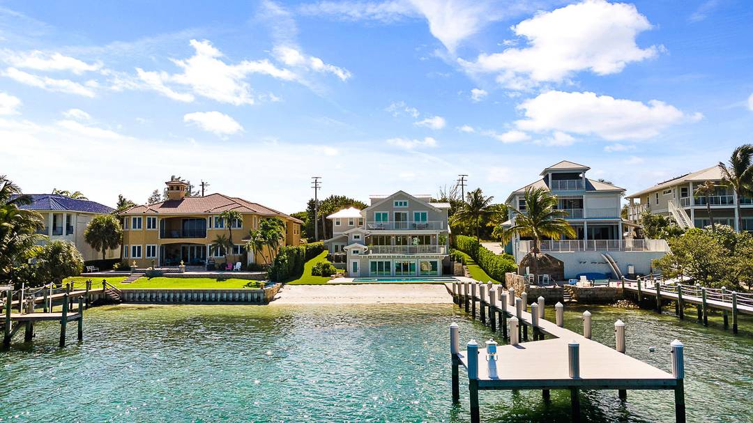 Welcome to your breathtaking Intracoastal Blue Water Estate built in 2021 with direct ocean access and no fixed bridges.