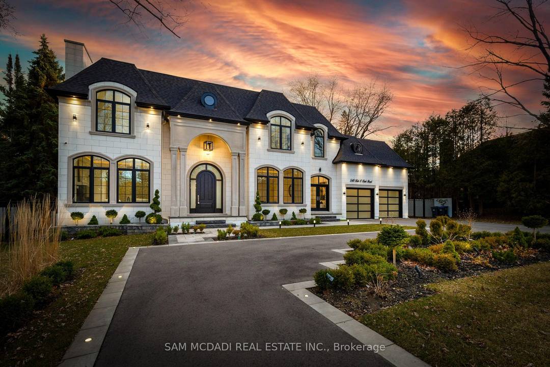 Meticulously designed on a sprawling 100' x 180' lot in the renowned Rattray Park Estates, this modern palatial beauty has been crafted with the utmost attention to detail.